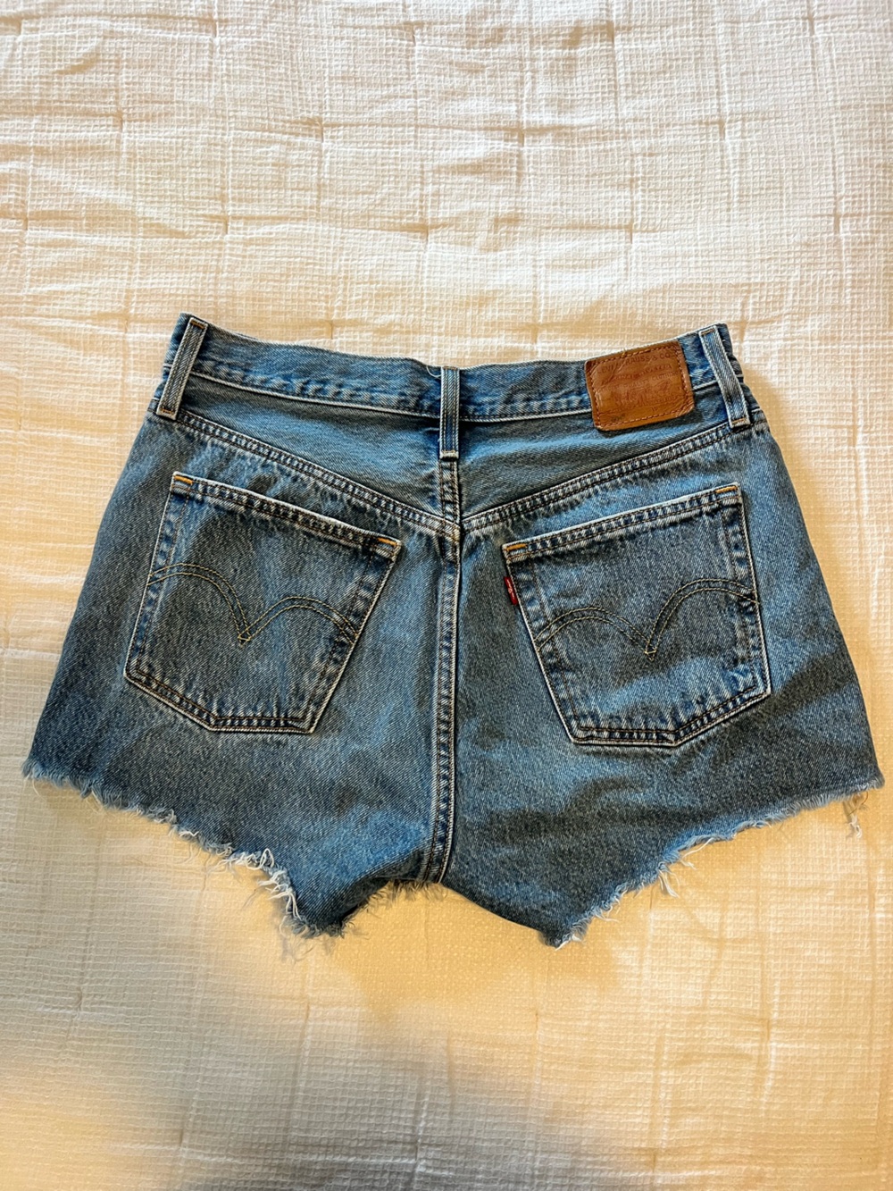 Levi's 501 Medium Blue Denim Cutoff Shorts with Frayed Hem